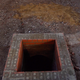 This hidden entranceway was found beneath large slabs weighing as much as 3,300 pounds. (Image: Garden Museum)